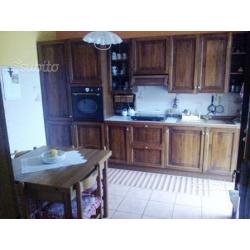 Casa con giardino